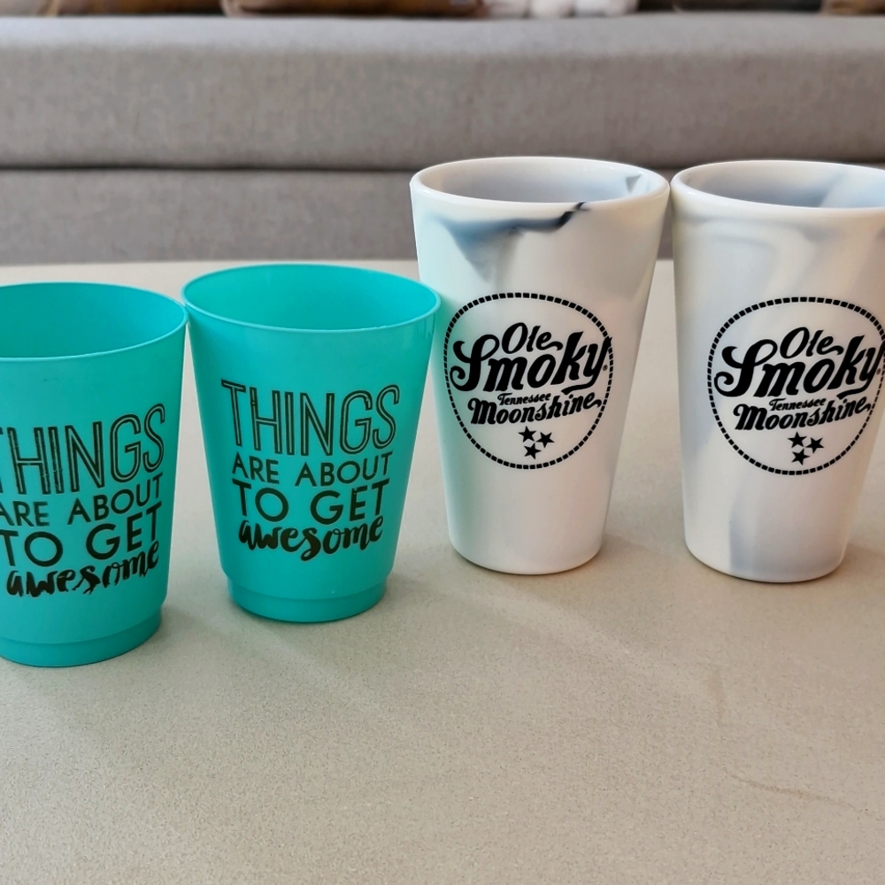Two Sets Of Picnic Cups
